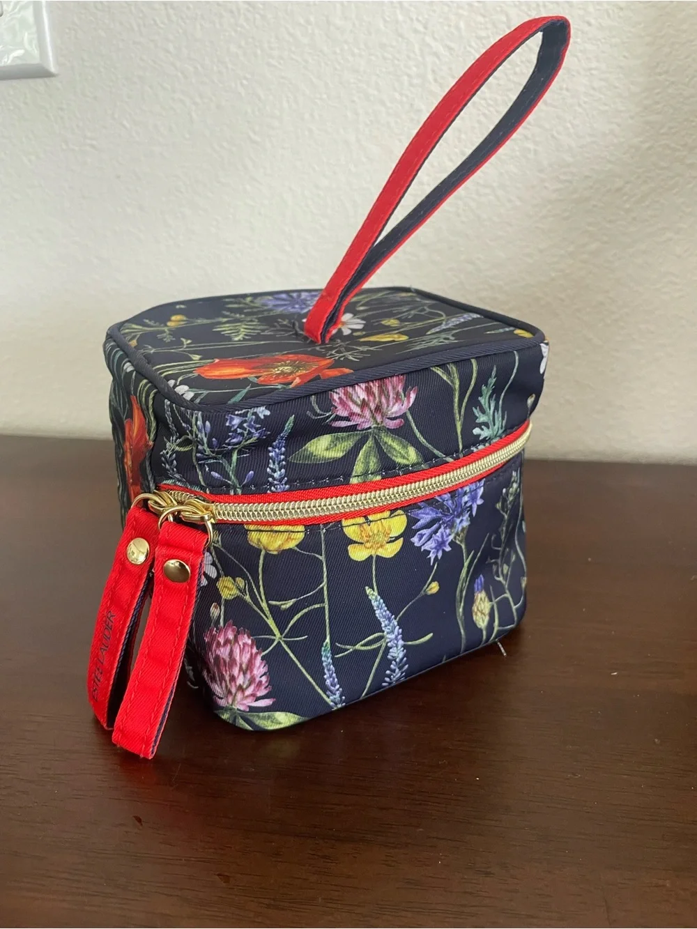 Estée Lauder Nylon Floral Cosmetic Wristlet with Red Accents, 5” sq, 4” high